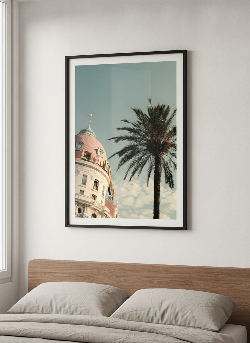 Minimalist artwork displayed in a calm, light-filled bedroom interior