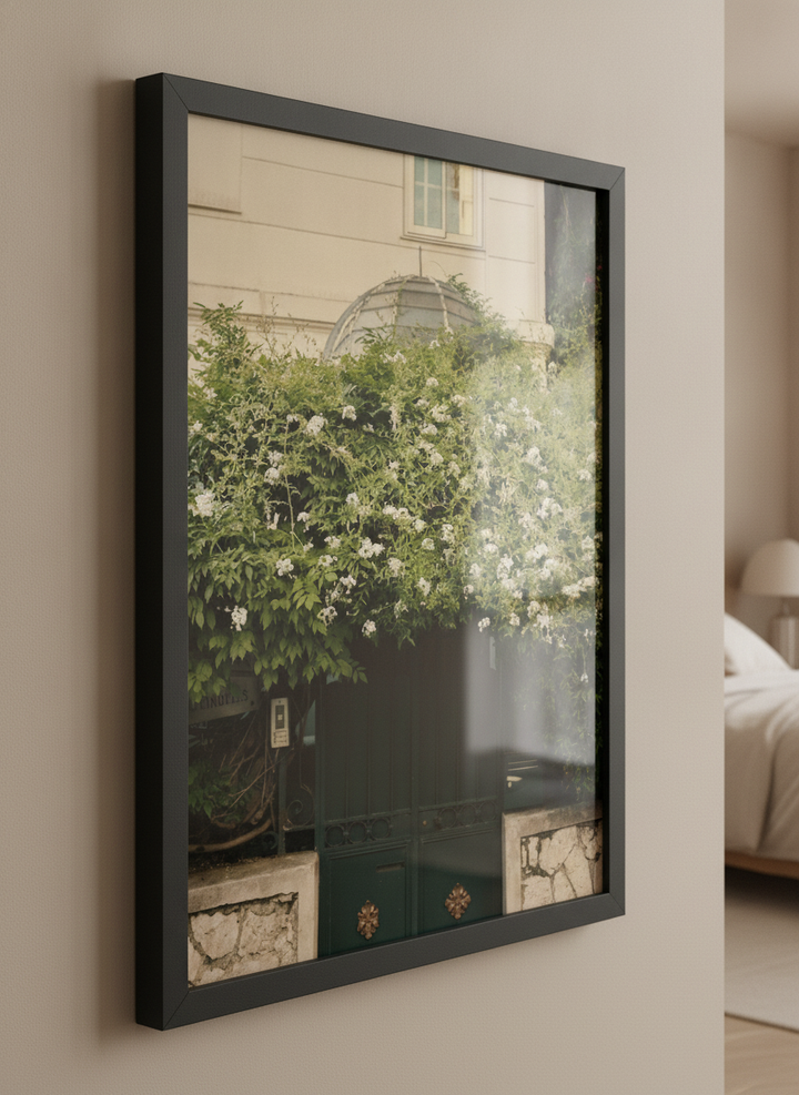 Minimalist artwork displayed in a calm, light-filled bedroom interior