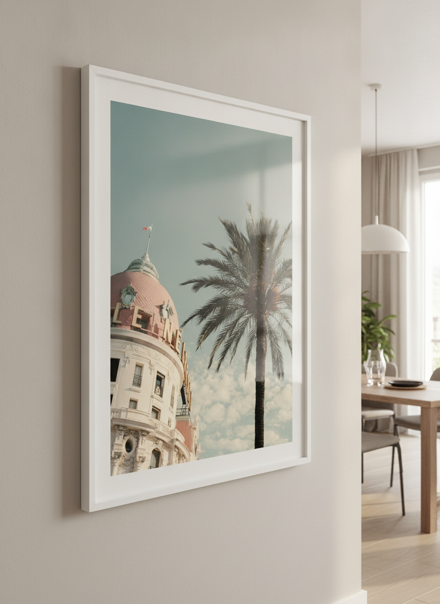 Wall art styled above a dining table in a contemporary home