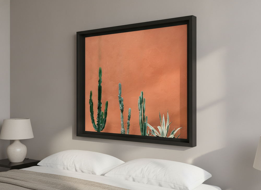 Minimalist artwork displayed in a calm, light-filled bedroom interior