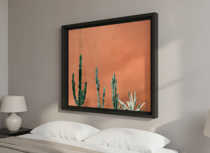 Minimalist artwork displayed in a calm, light-filled bedroom interior