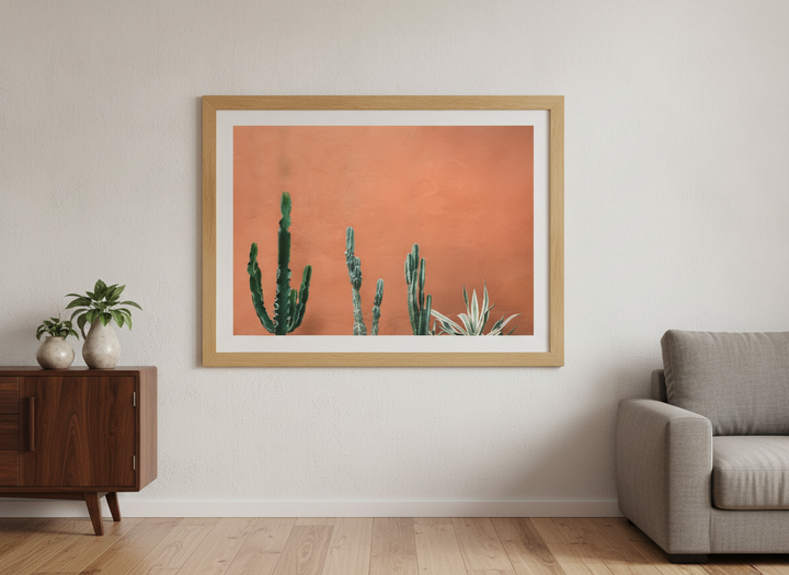 Modern wall art styled above a sofa in a neutral living room