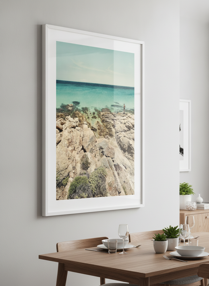 Wall art styled above a dining table in a contemporary home