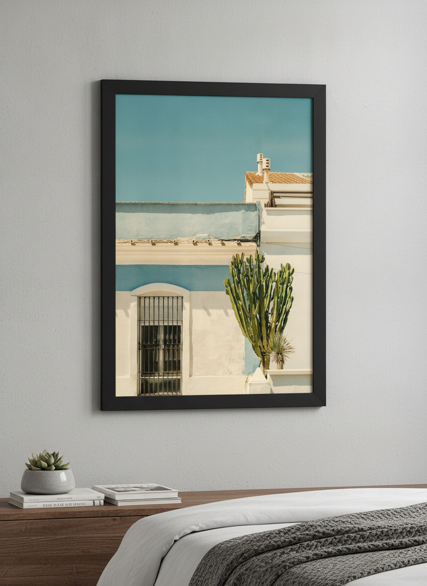 Minimalist artwork displayed in a calm, light-filled bedroom interior