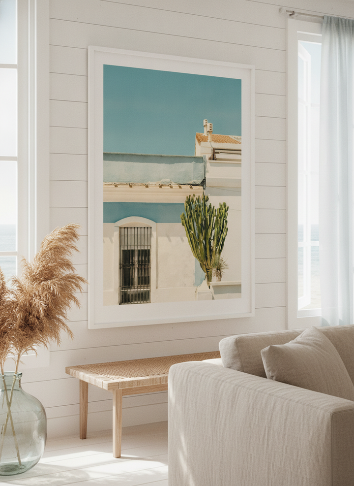 Neutral wall art displayed in a sunny coastal beach house
