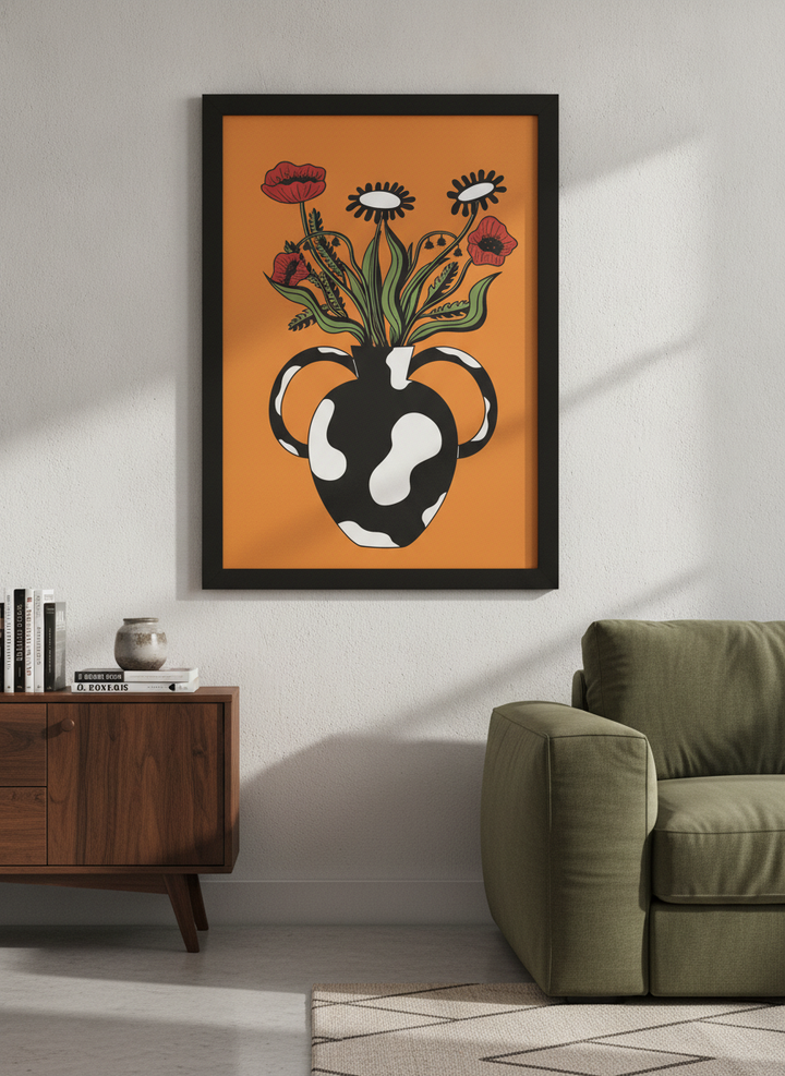 Modern wall art styled above a sofa in a neutral living room