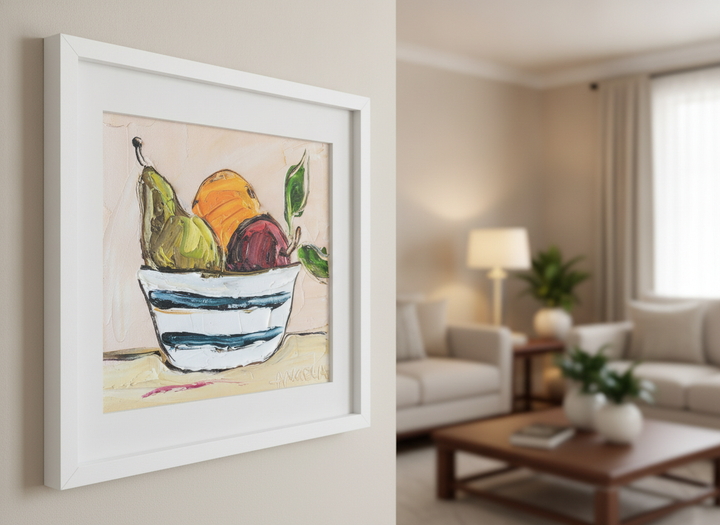 Modern wall art styled above a sofa in a neutral living room