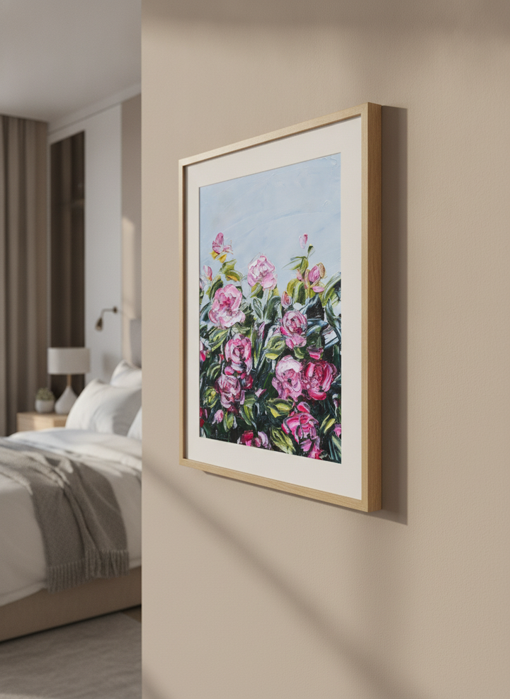 Minimalist artwork displayed in a calm, light-filled bedroom interior
