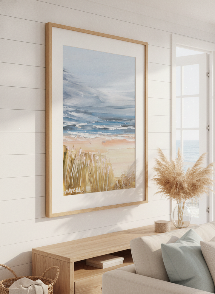 Neutral wall art displayed in a sunny coastal beach house