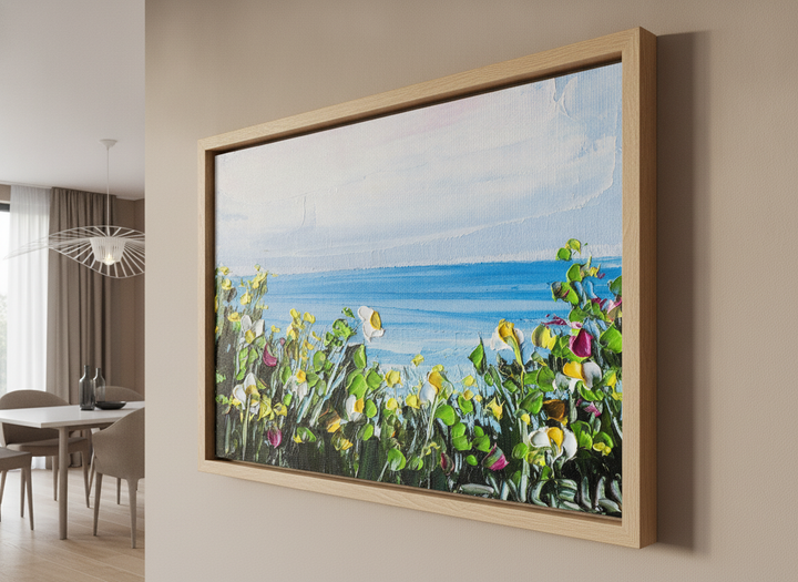 Wall art styled above a dining table in a contemporary home