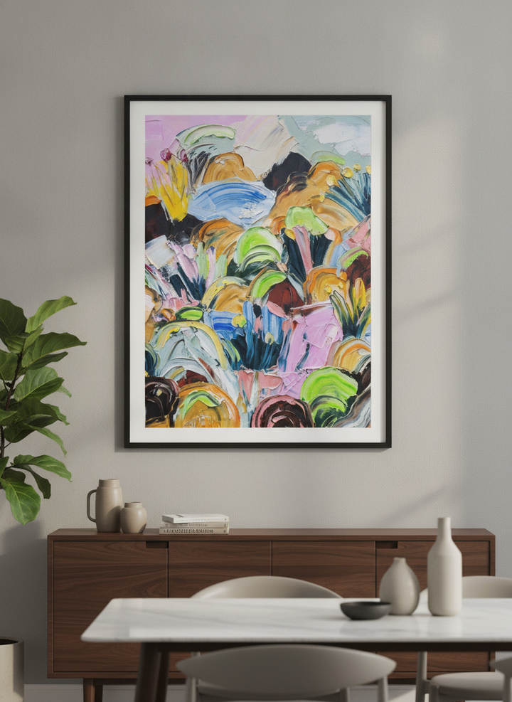 Wall art styled above a dining table in a contemporary home