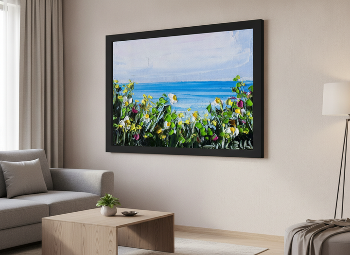 Modern wall art styled above a sofa in a neutral living room