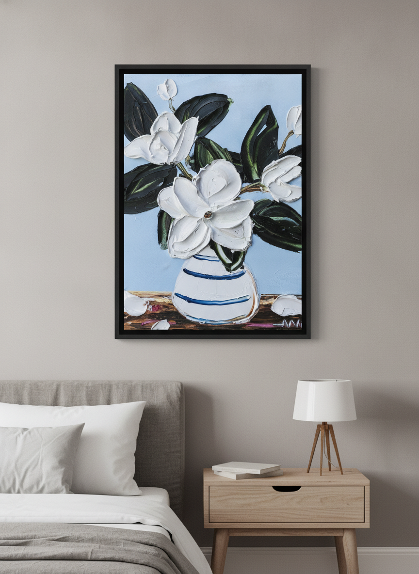 Minimalist artwork displayed in a calm, light-filled bedroom interior