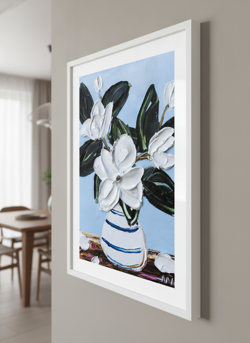 Wall art styled above a dining table in a contemporary home