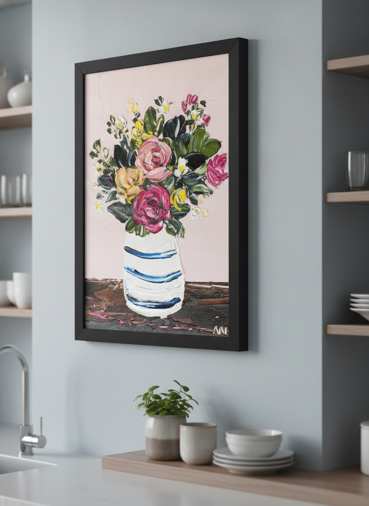 Artwork styled on the wall of a bright modern kitchen