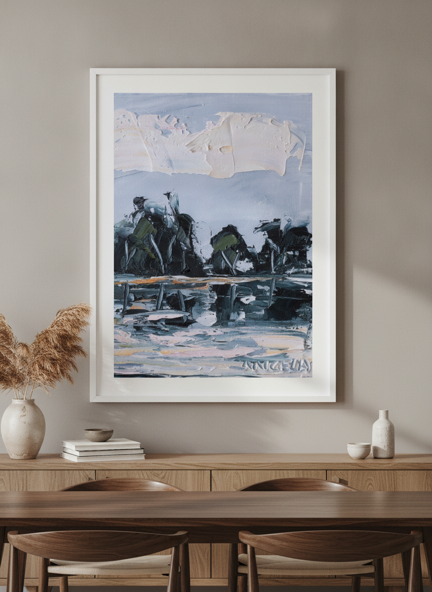 Wall art styled above a dining table in a contemporary home