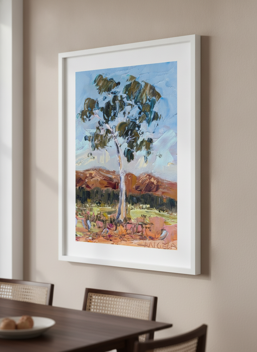 Wall art styled above a dining table in a contemporary home