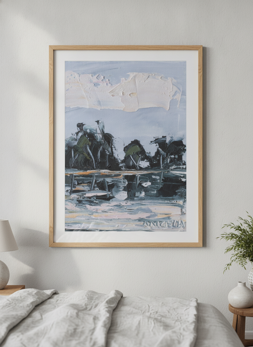Minimalist artwork displayed in a calm, light-filled bedroom interior