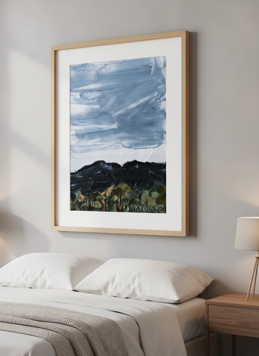 Minimalist artwork displayed in a calm, light-filled bedroom interior
