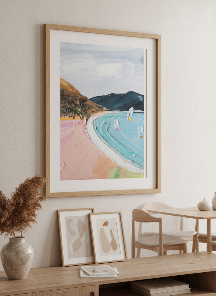 Wall art styled above a dining table in a contemporary home