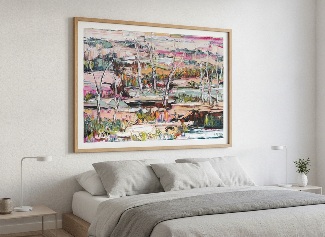 Minimalist artwork displayed in a calm, light-filled bedroom interior
