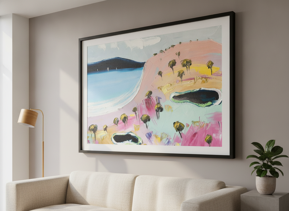 Modern wall art styled above a sofa in a neutral living room