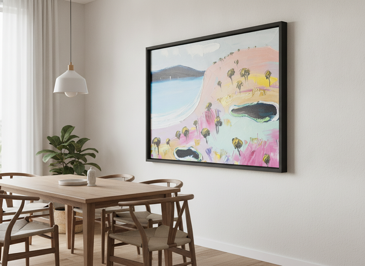Wall art styled above a dining table in a contemporary home