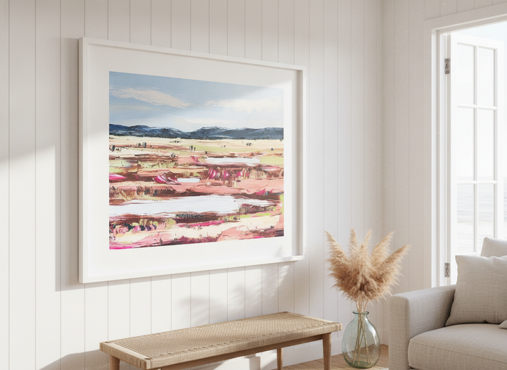 Neutral wall art displayed in a sunny coastal beach house