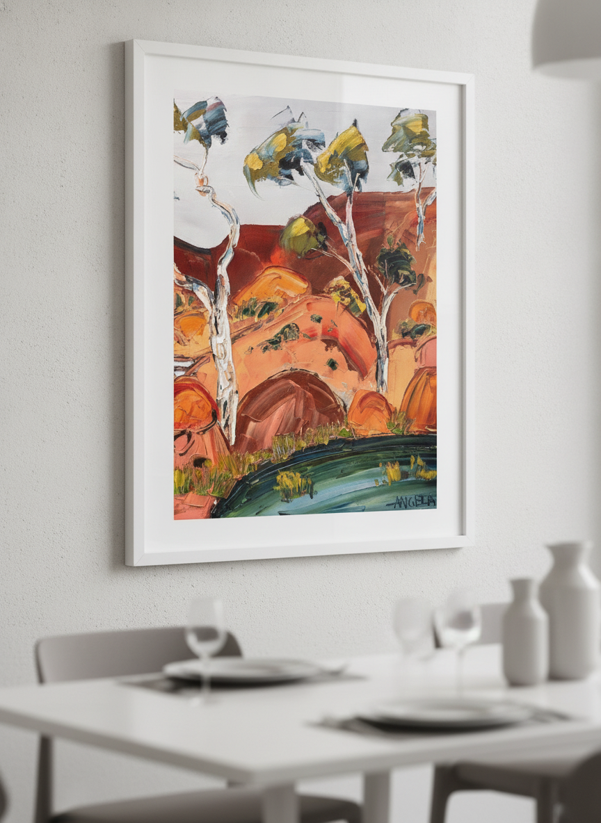 Wall art styled above a dining table in a contemporary home