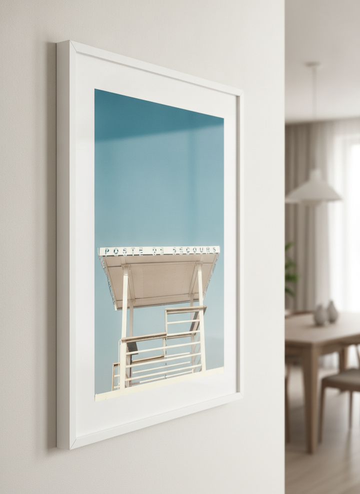 Wall art styled above a dining table in a contemporary home