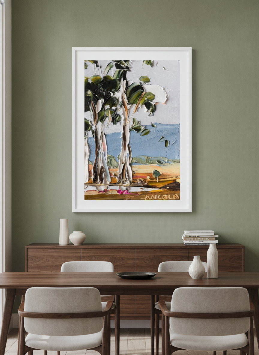 Wall art styled above a dining table in a contemporary home
