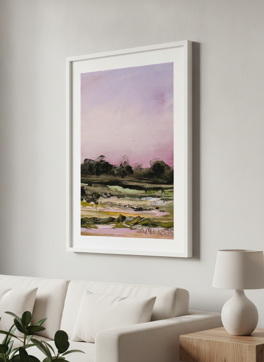 Modern wall art styled above a sofa in a neutral living room