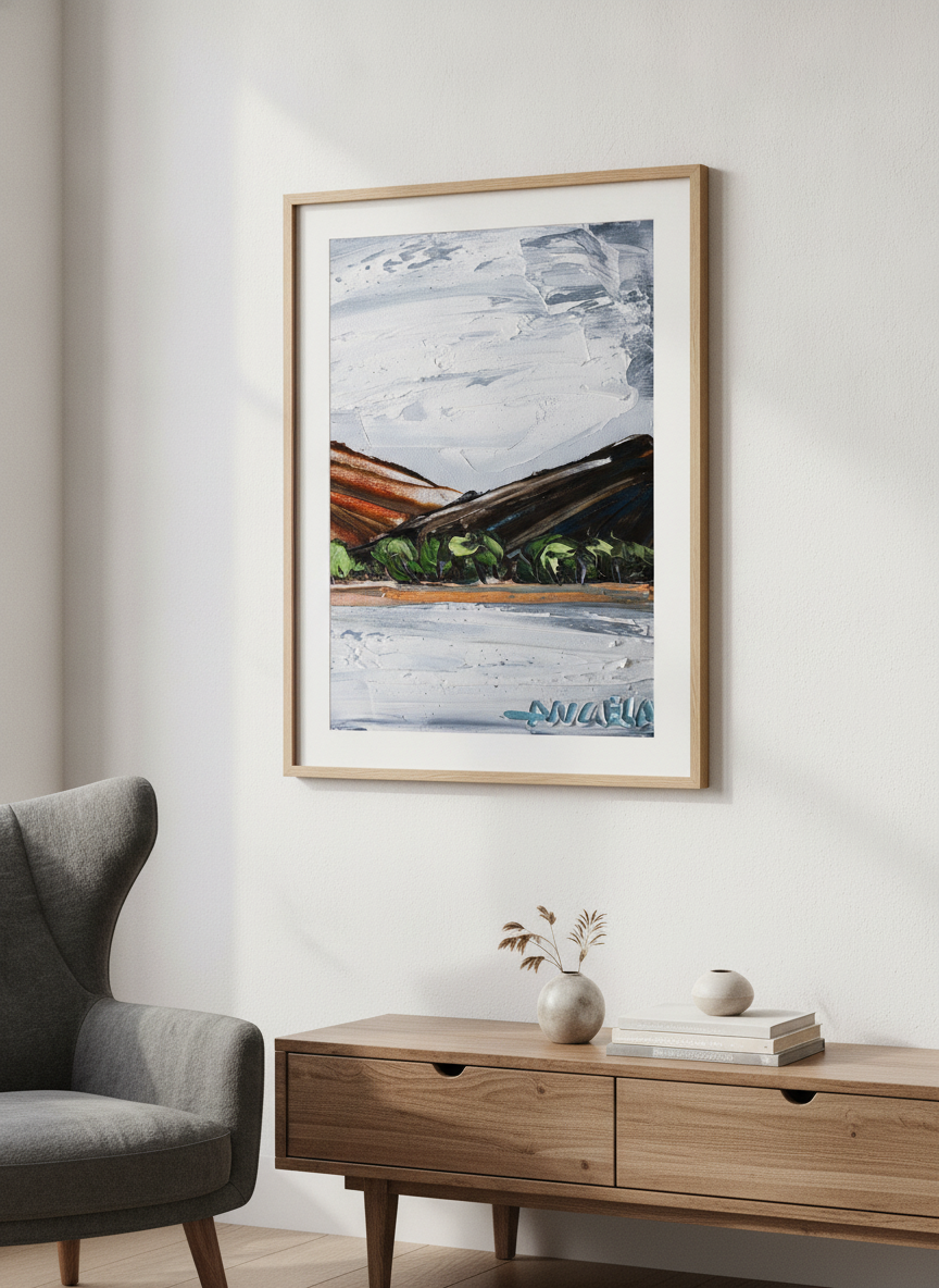 Modern wall art styled above a sofa in a neutral living room