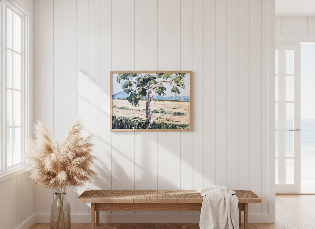 Neutral wall art displayed in a sunny coastal beach house