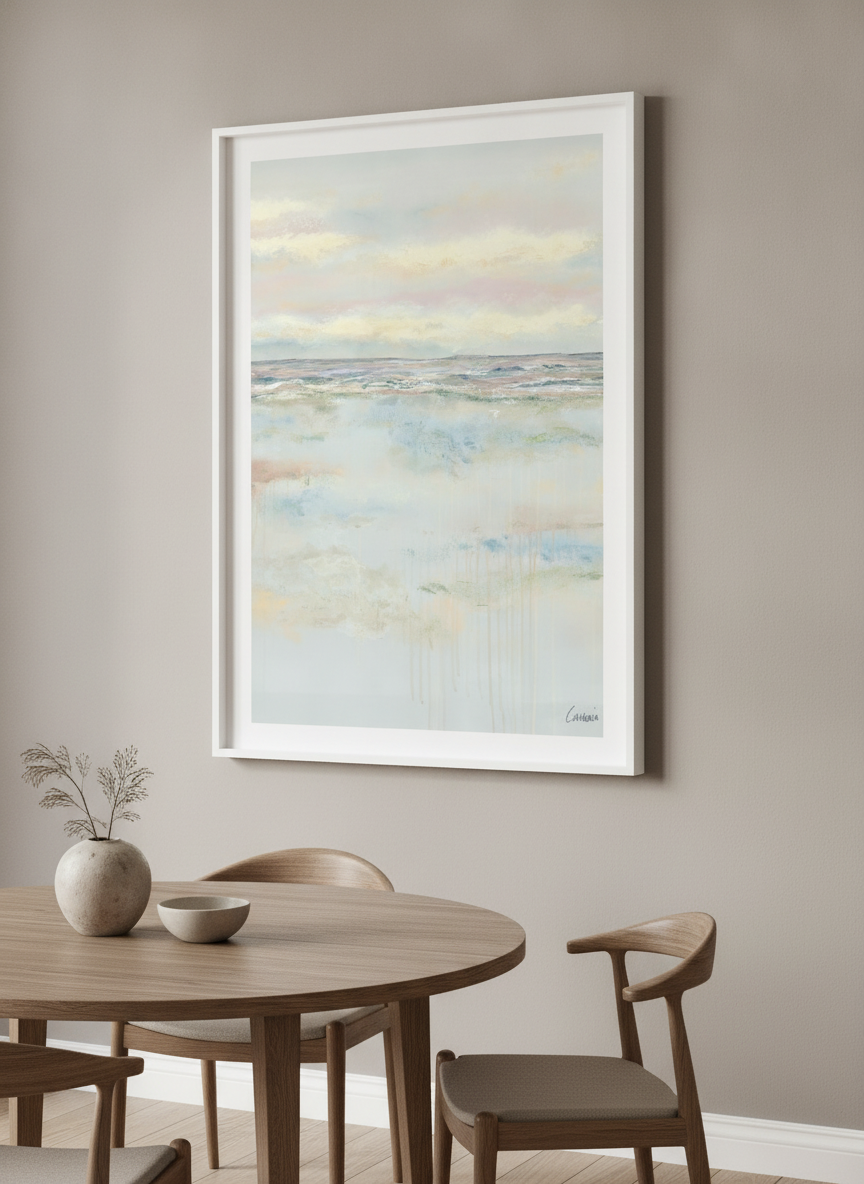 Wall art styled above a dining table in a contemporary home