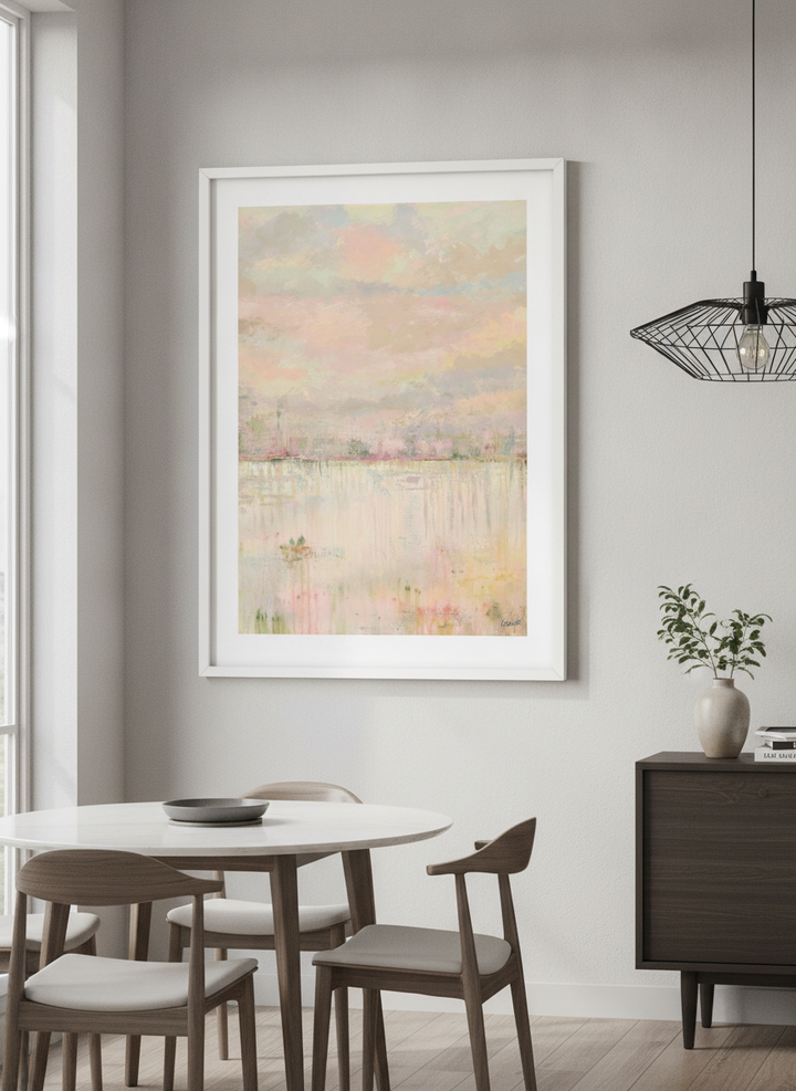 Wall art styled above a dining table in a contemporary home