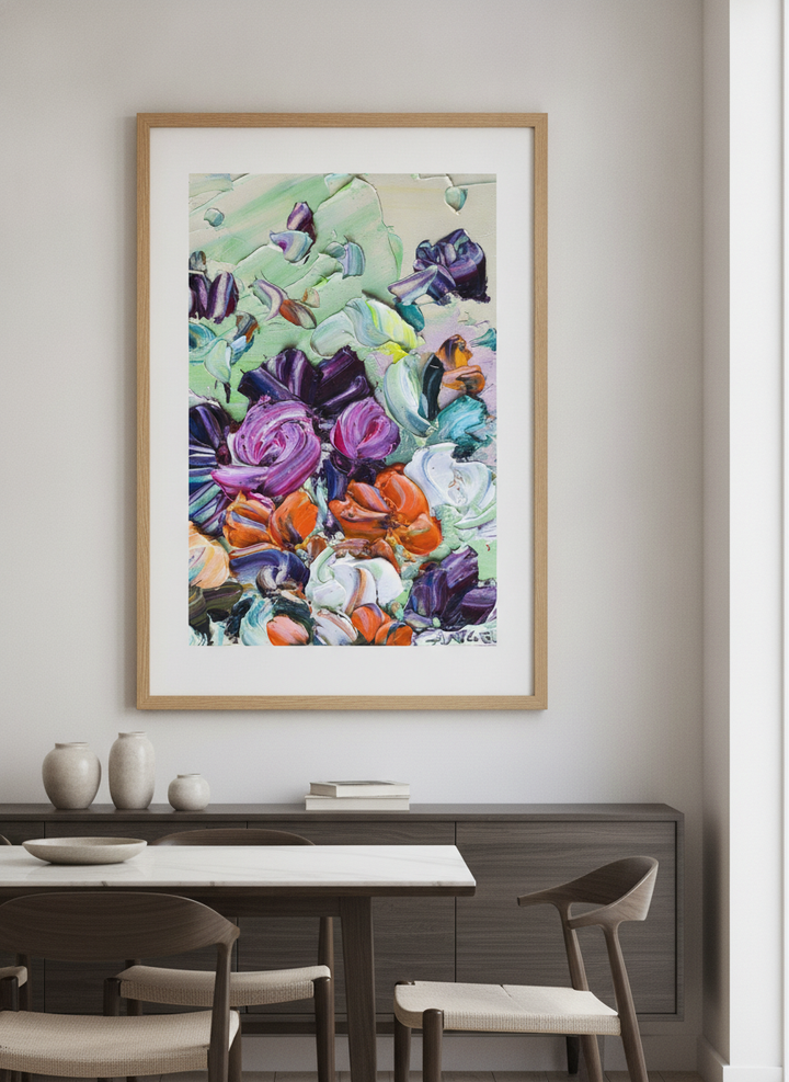 Wall art styled above a dining table in a contemporary home