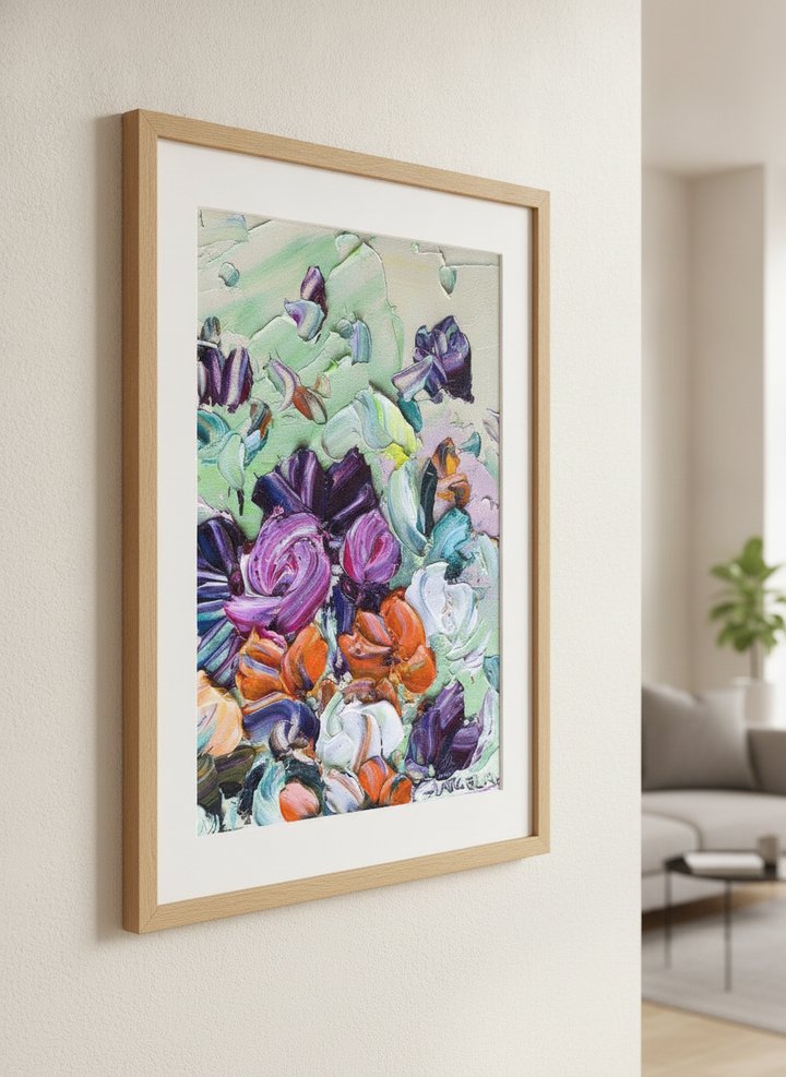 Modern wall art styled above a sofa in a neutral living room