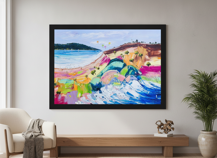 Modern wall art styled above a sofa in a neutral living room