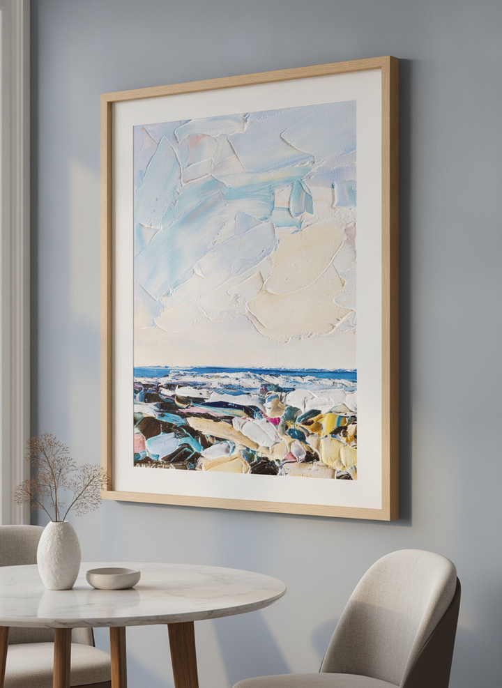 Wall art styled above a dining table in a contemporary home