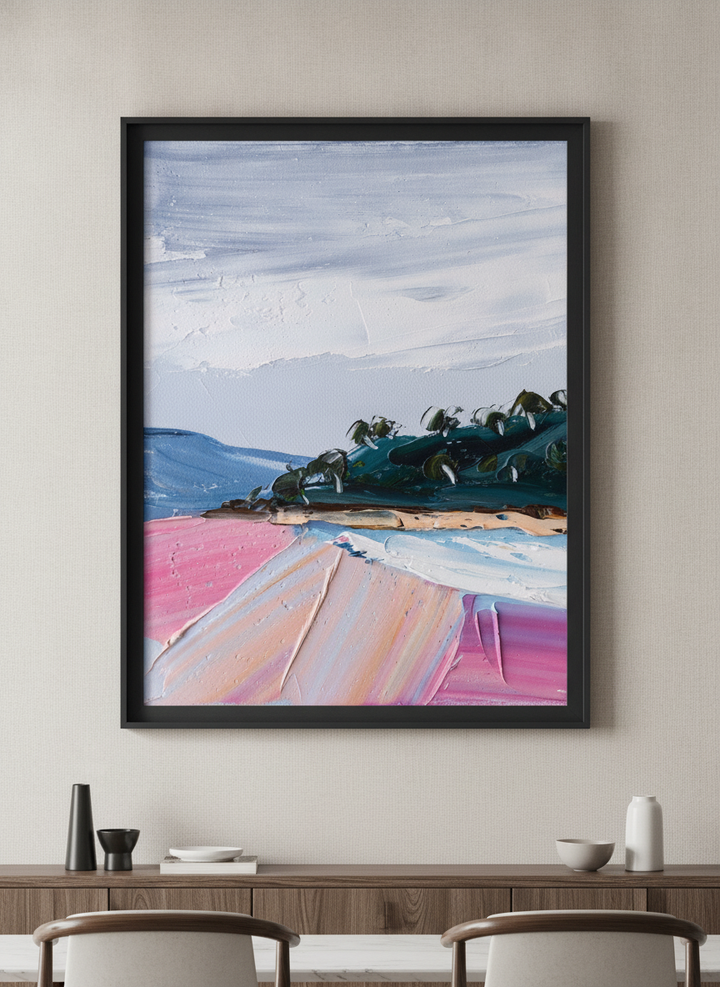 Wall art styled above a dining table in a contemporary home