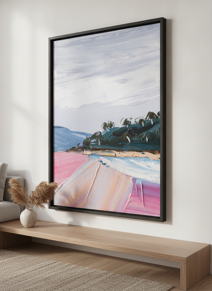 Modern wall art styled above a sofa in a neutral living room