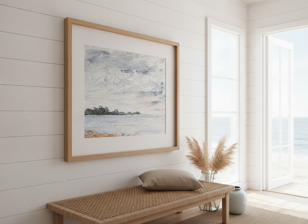 Neutral wall art displayed in a sunny coastal beach house