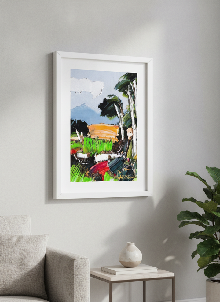 Modern wall art styled above a sofa in a neutral living room