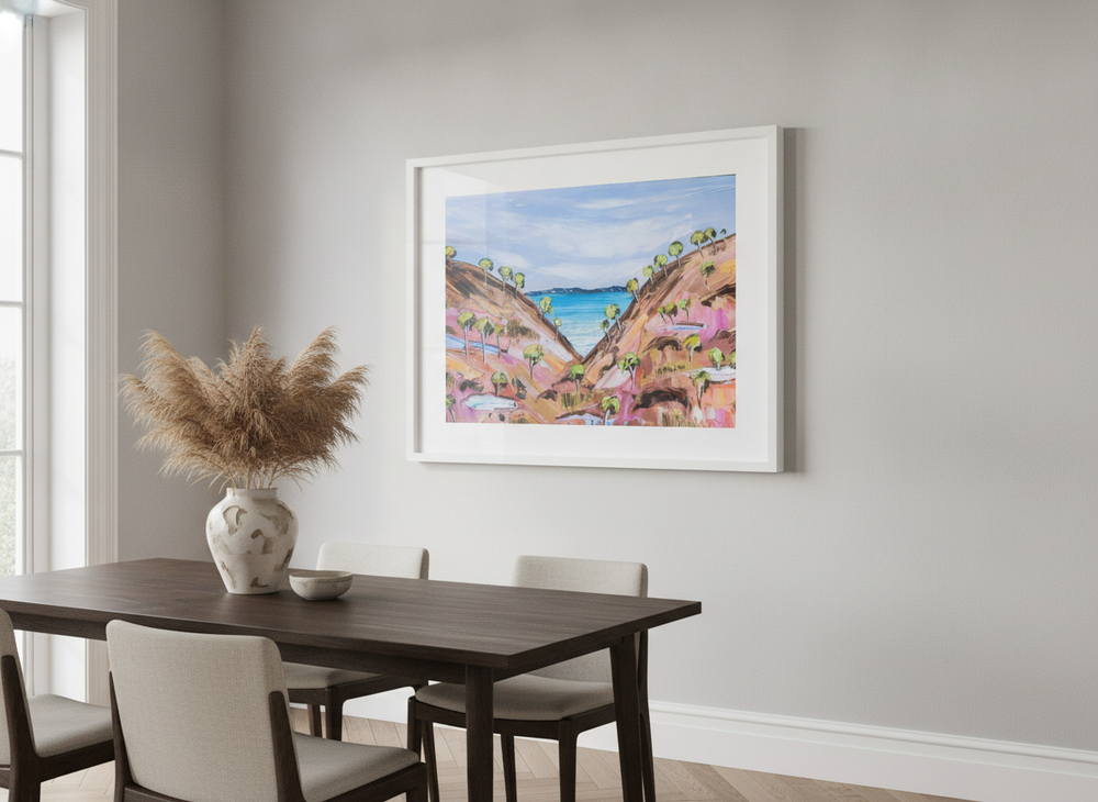 Wall art styled above a dining table in a contemporary home