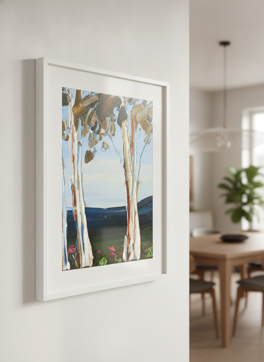 Wall art styled above a dining table in a contemporary home