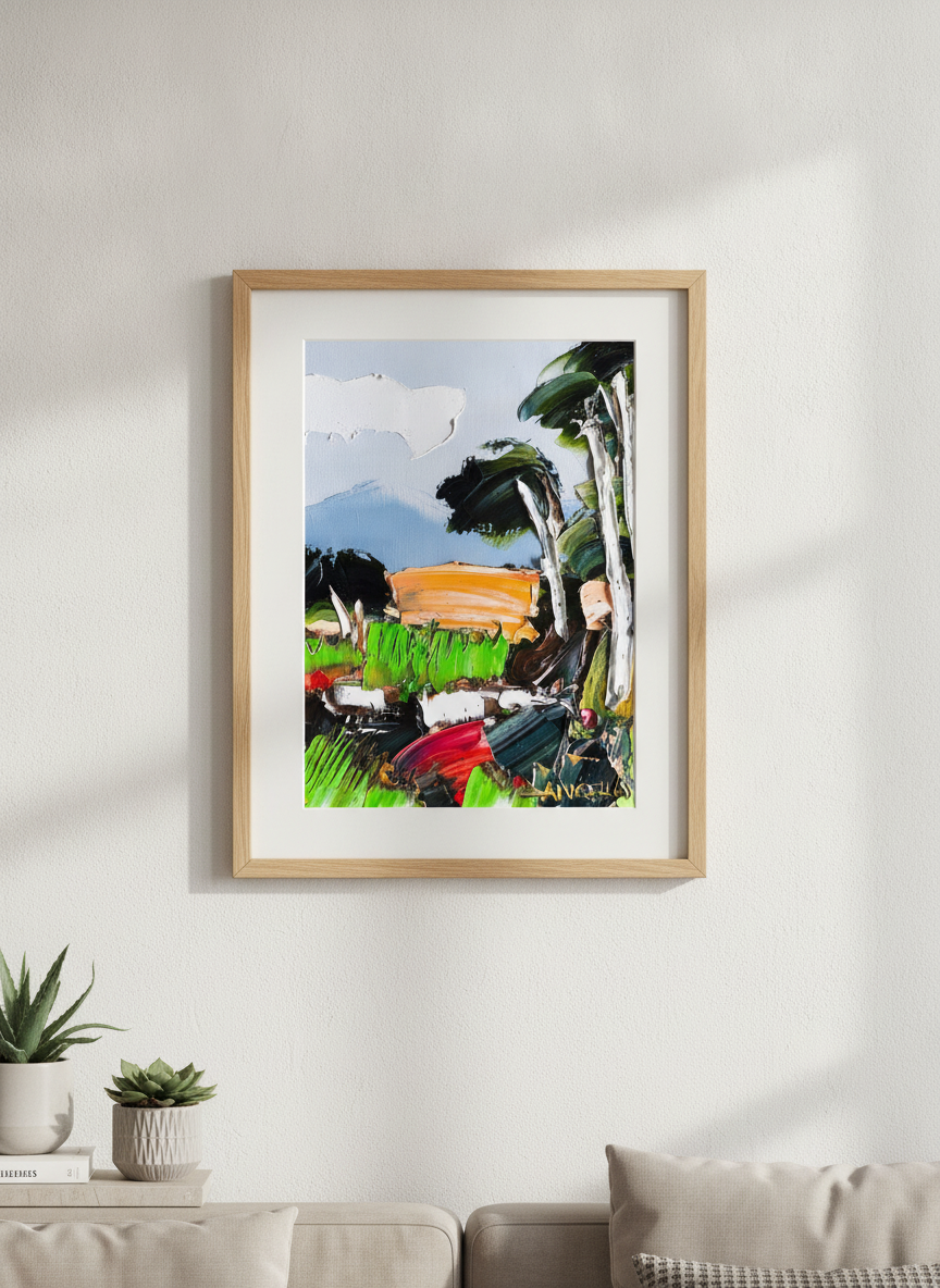 Modern wall art styled above a sofa in a neutral living room