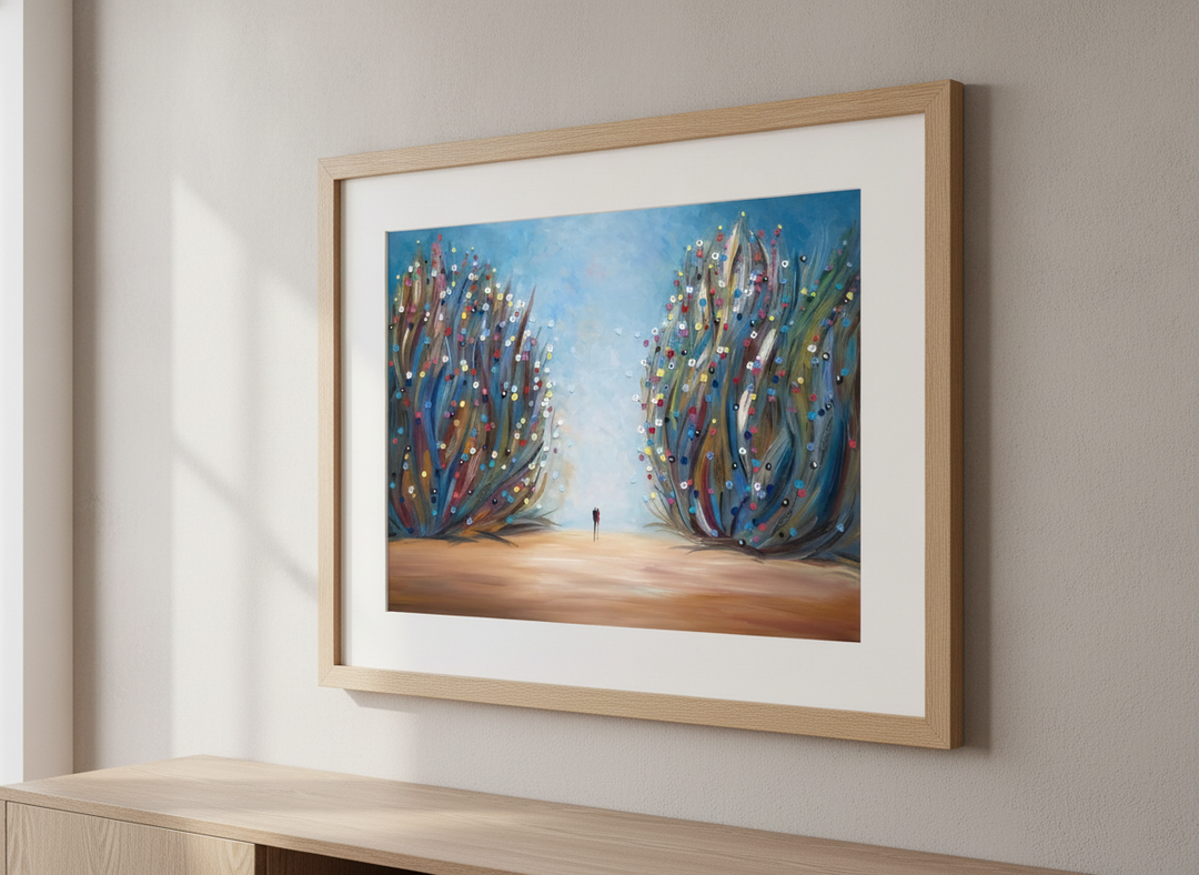 Modern wall art styled above a sofa in a neutral living room