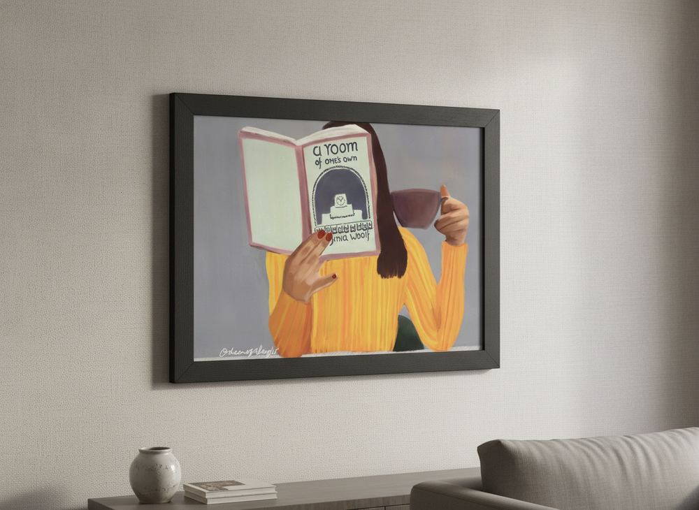 Modern wall art styled above a sofa in a neutral living room