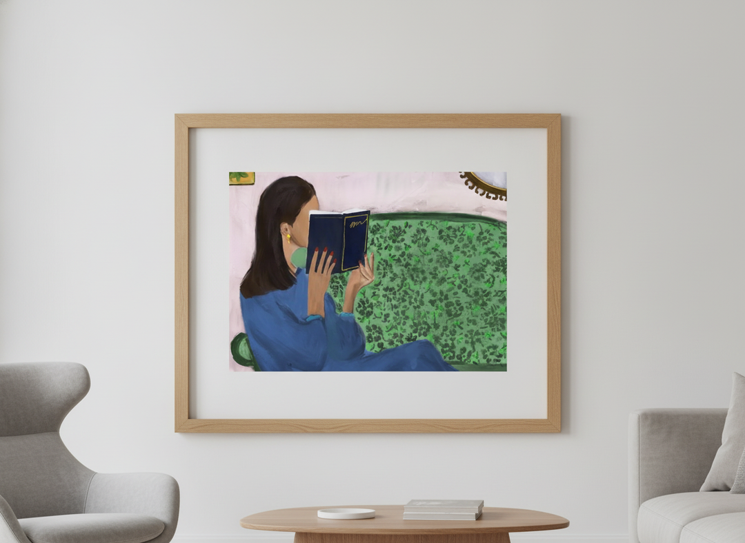 Modern wall art styled above a sofa in a neutral living room